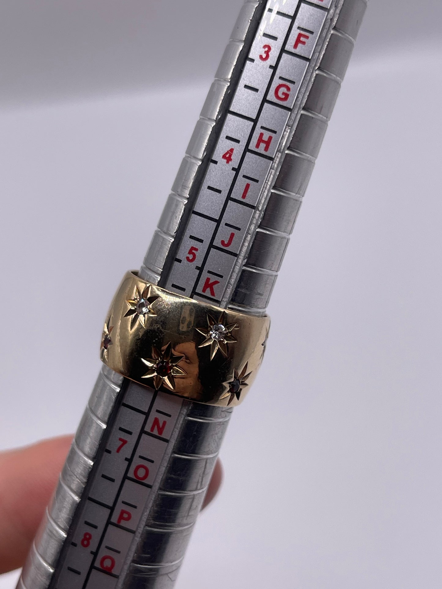 9ct gold garnet and cz star band