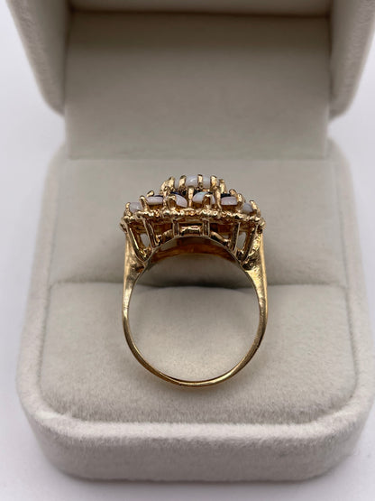 Heavy 9ct gold opal and sapphire cluster ring