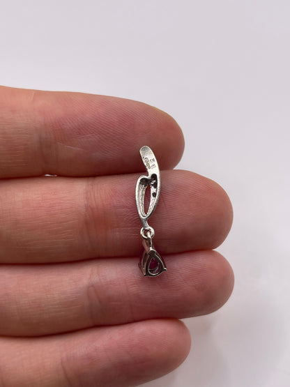 9ct white gold ruby and diamond pendant