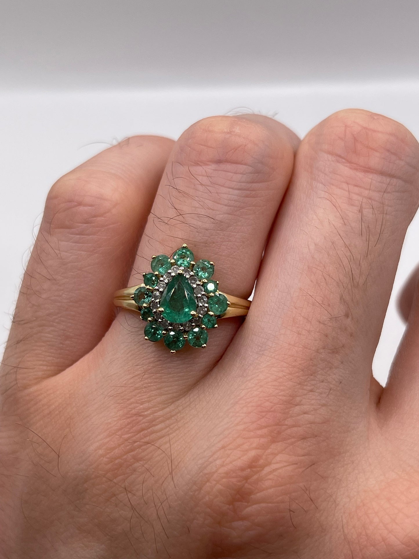 9ct gold emerald and diamond cluster ring