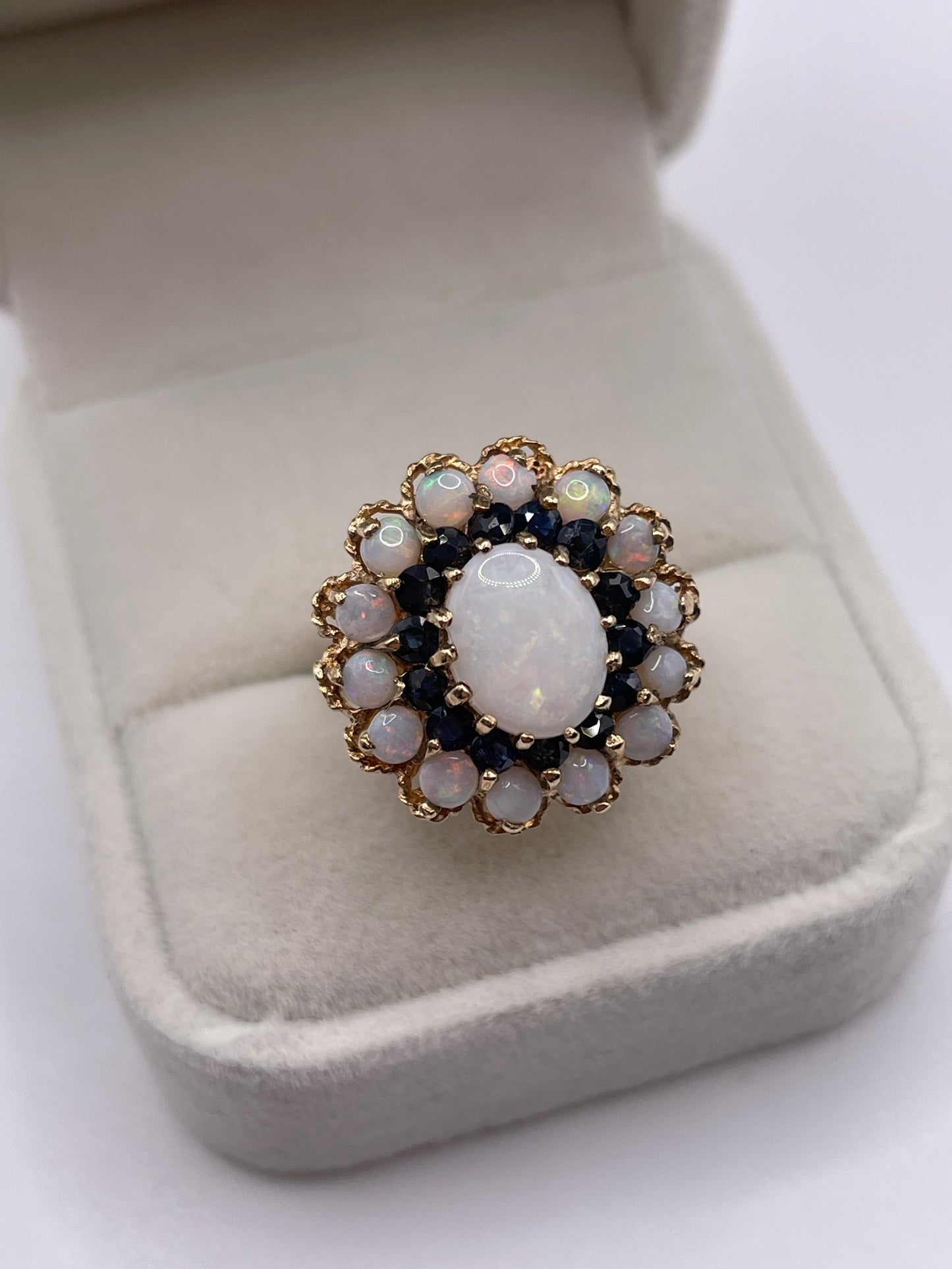 Heavy 9ct gold opal and sapphire cluster ring