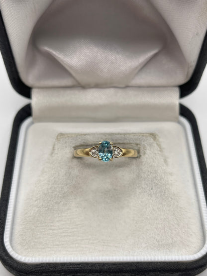 9ct gold blue zircon and diamond ring