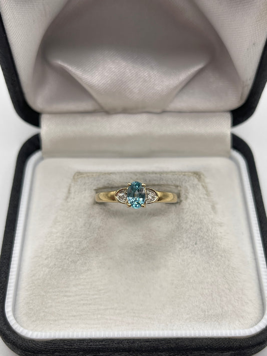 9ct gold blue zircon and diamond ring