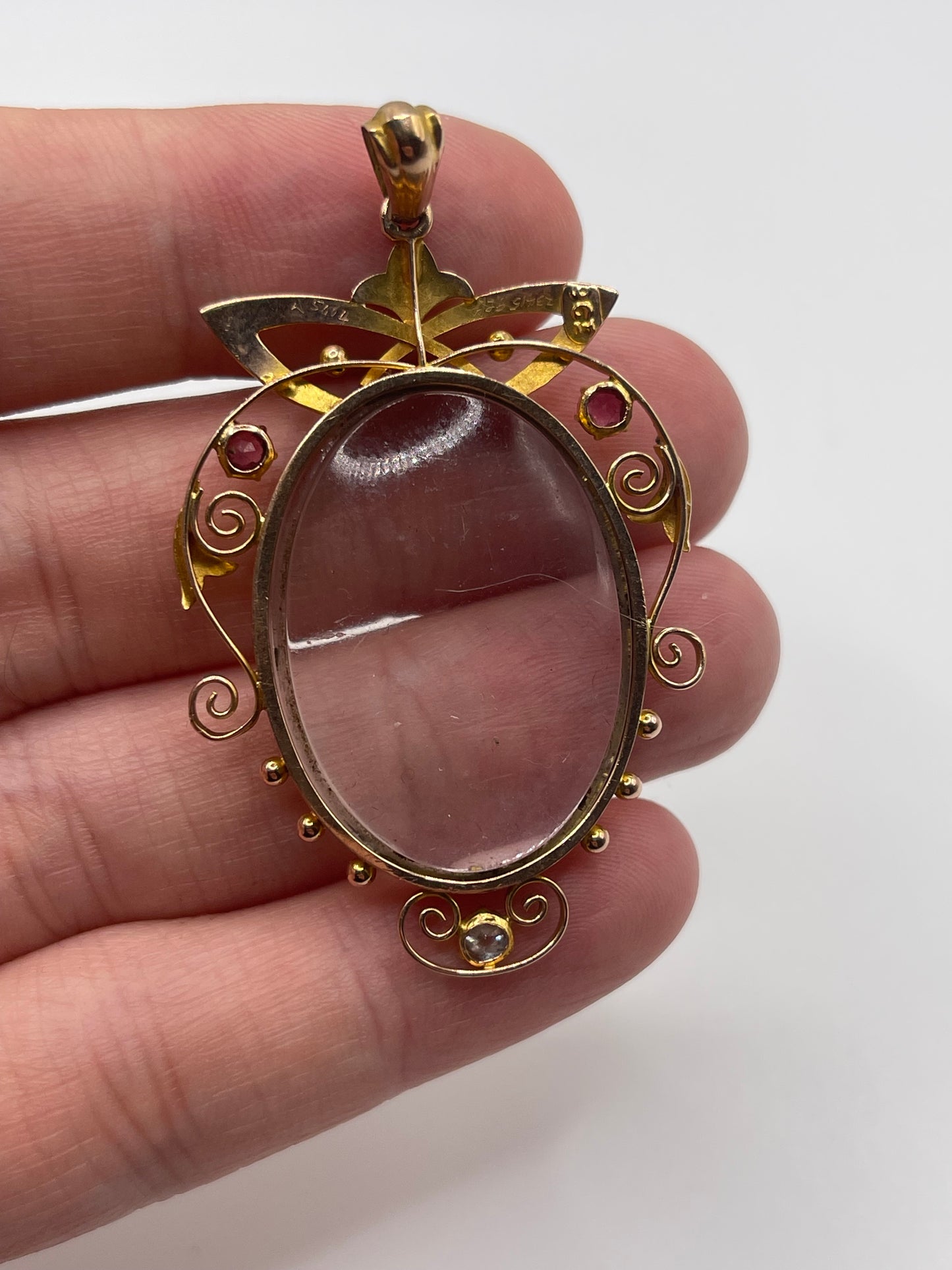 Antique 9ct rose gold garnet and diamond locket / pendant