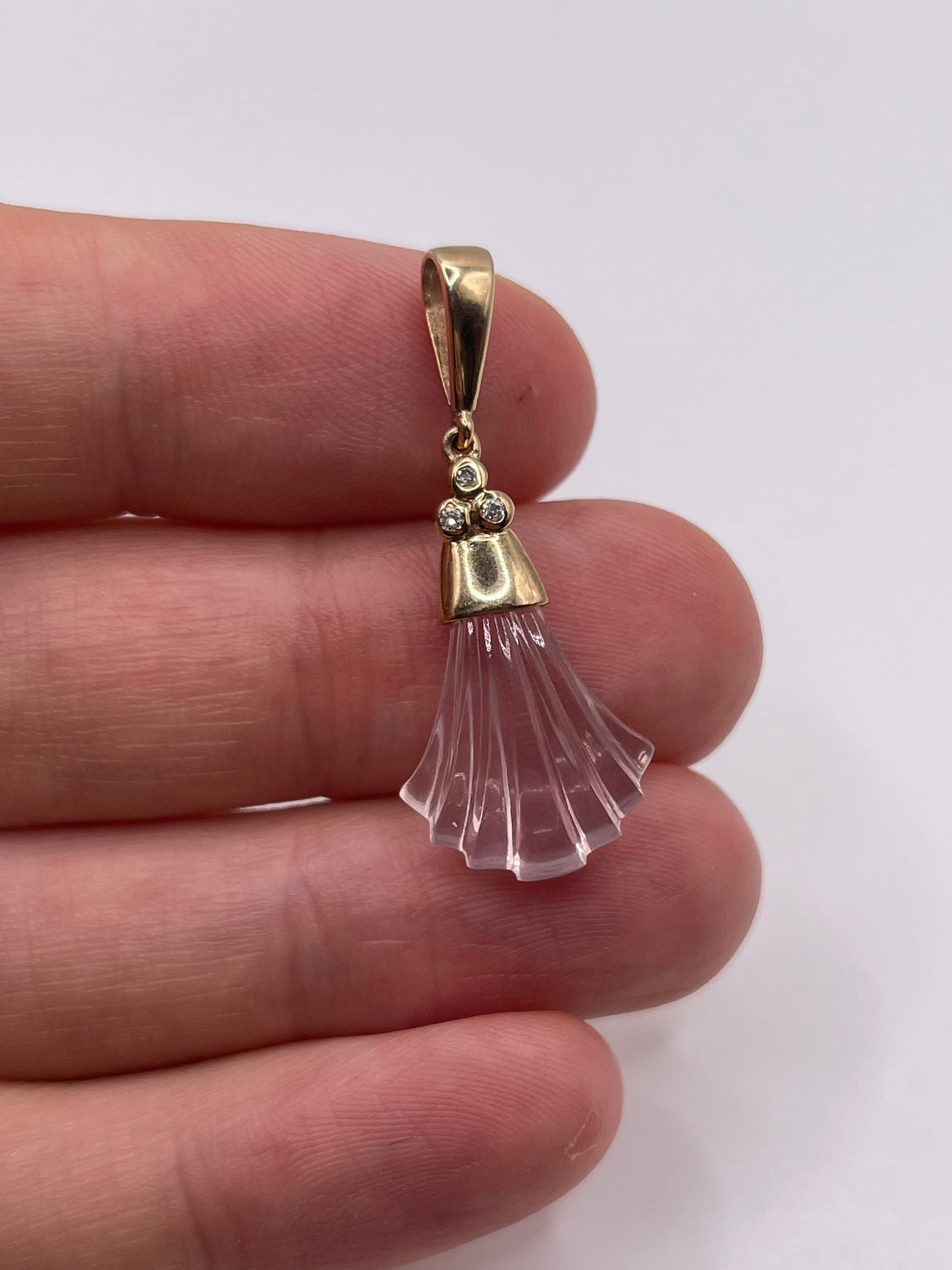 9ct rose quartz and diamond pendant