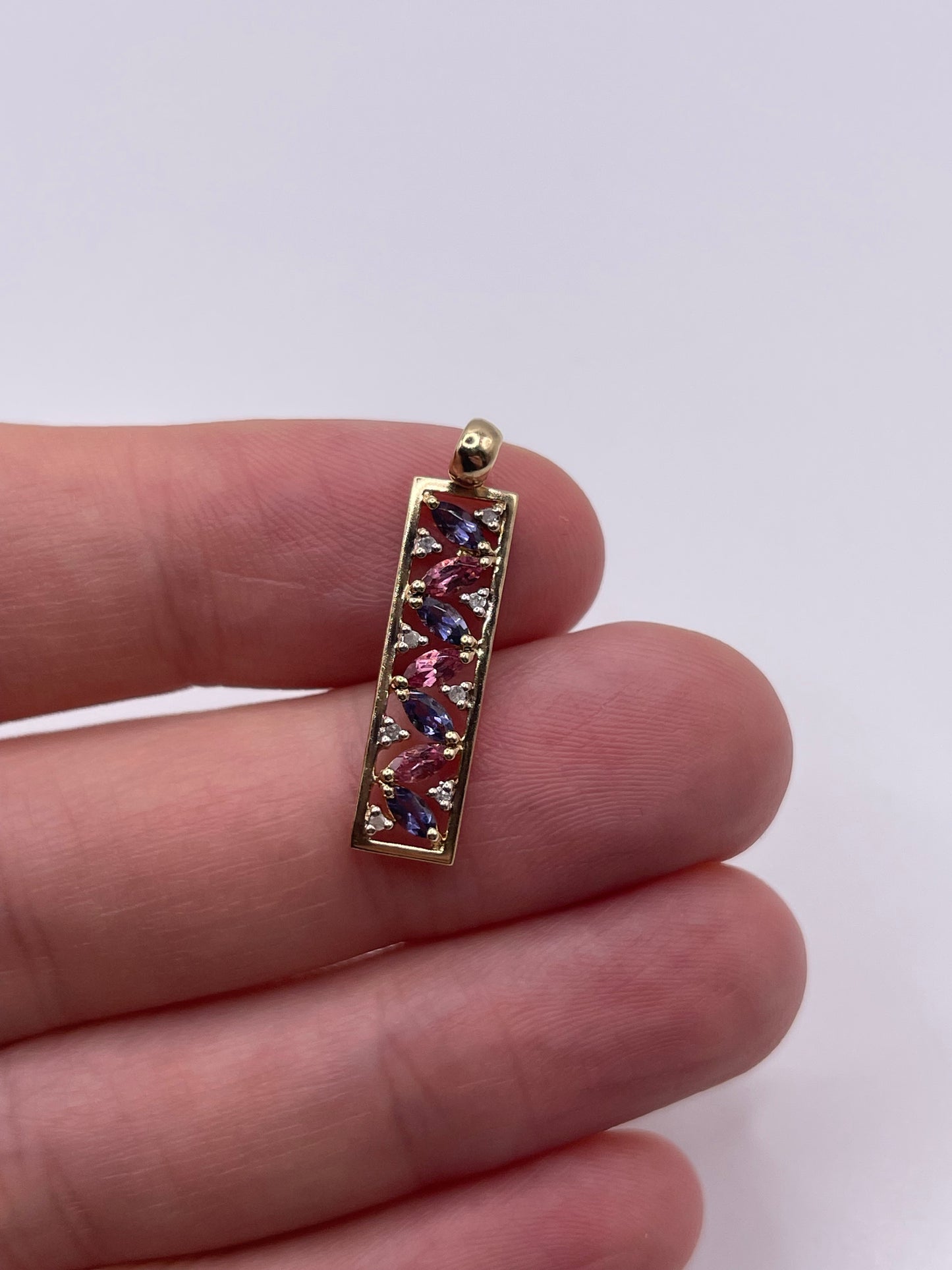 9ct gold iolite, topaz and diamond pendant