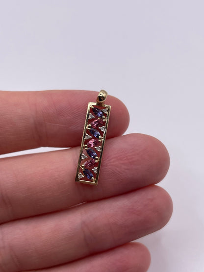 9ct gold iolite, topaz and diamond pendant