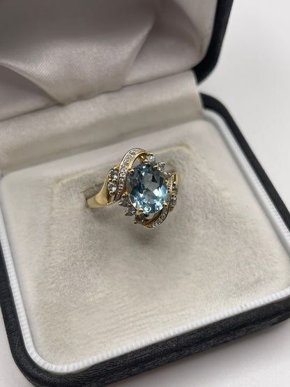 9ct gold blue topaz and diamond ring