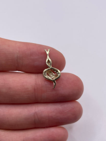 9ct gold diamond snake pendant