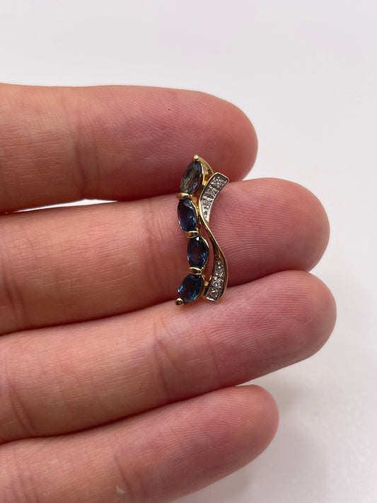 9ct gold topaz and diamond pendant