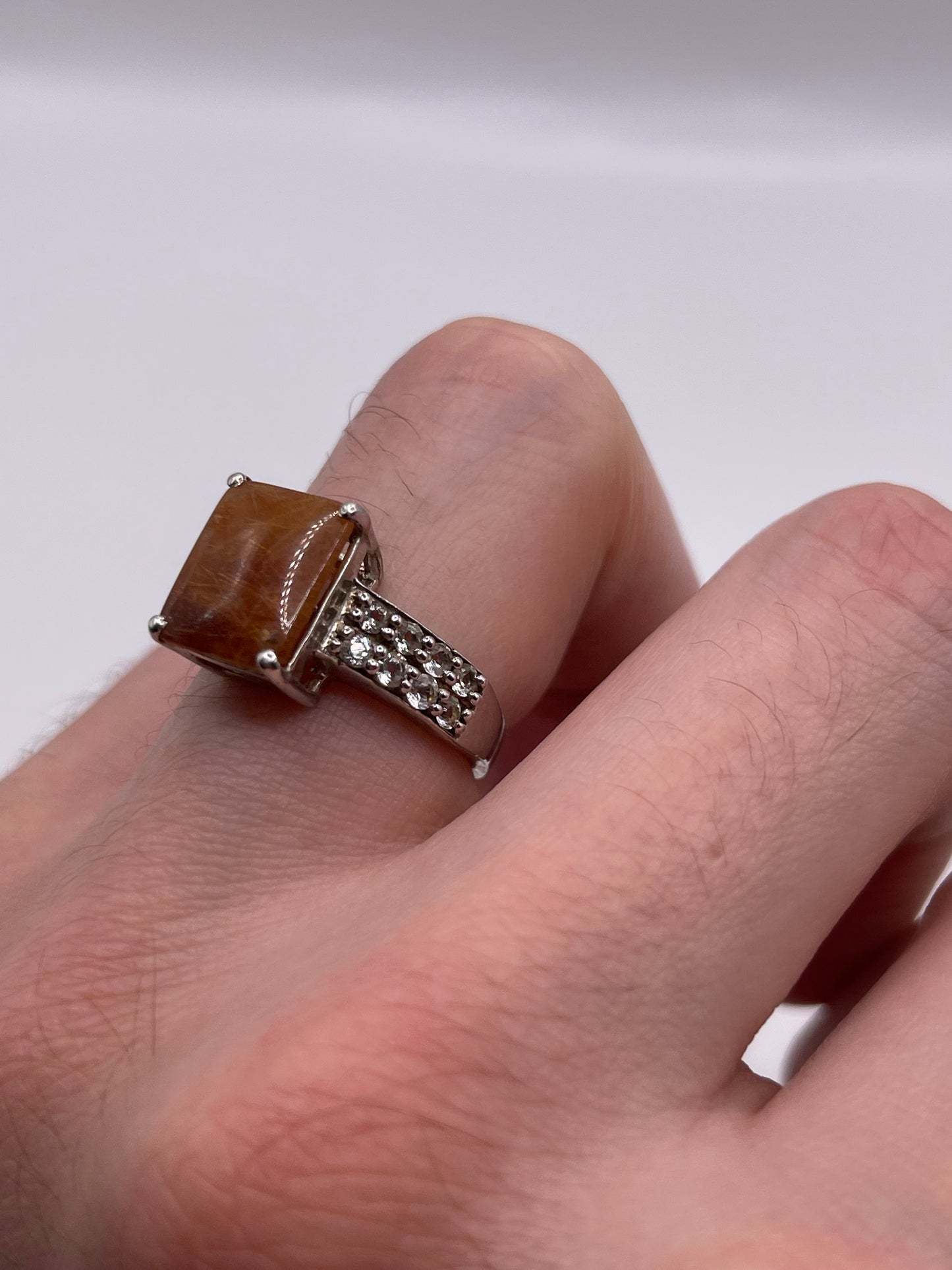 Silver rutile quartz and topaz ring