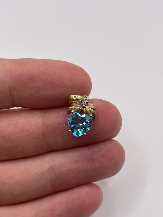 9ct gold topaz and diamond pendant