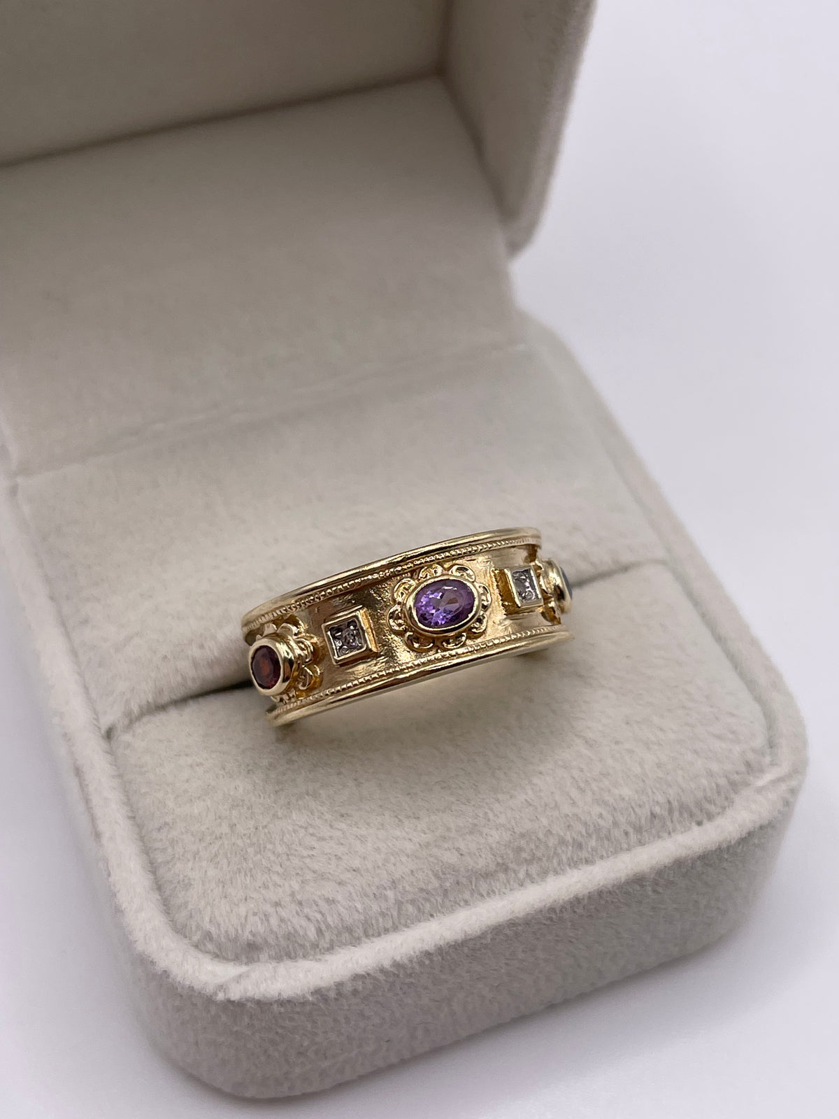 9ct gold amethyst, garnet, sapphire and diamond ring