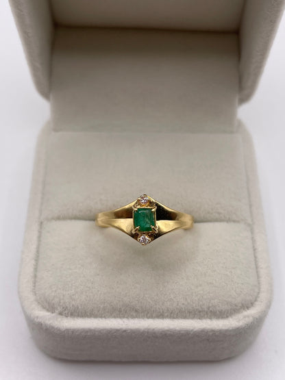 18ct gold emerald and zircon ring