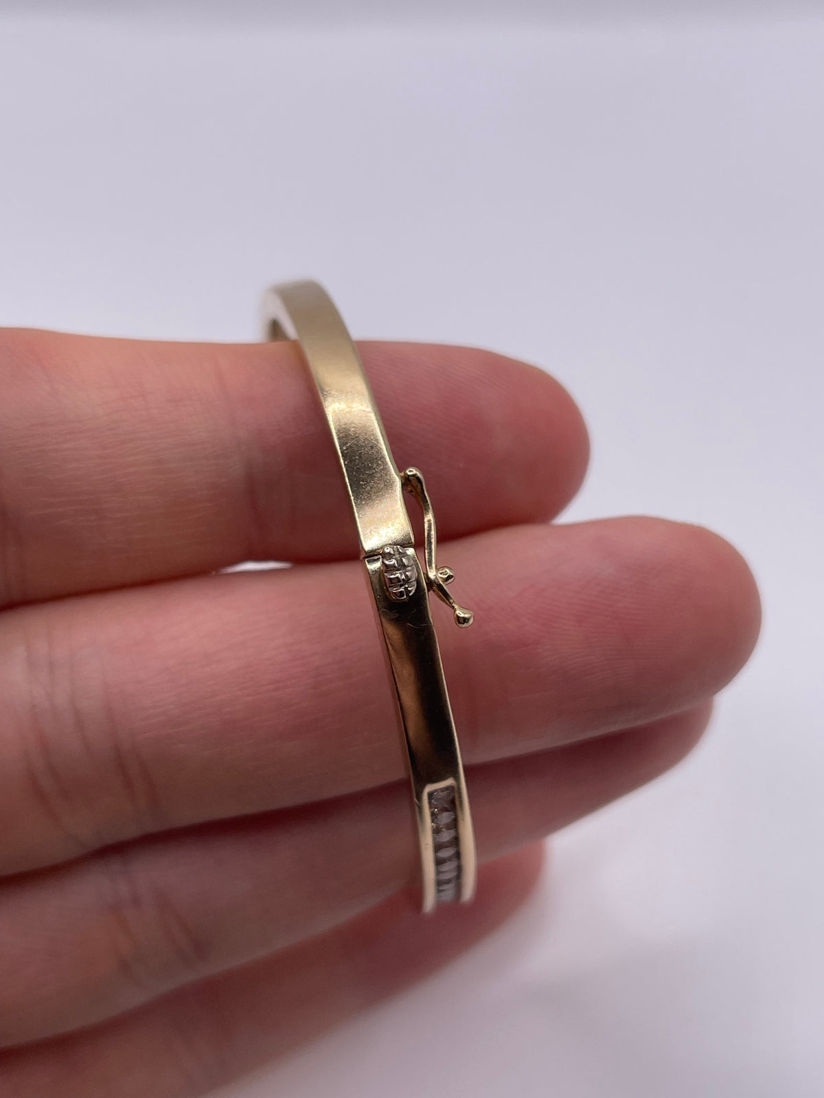 Heavy 9ct gold diamond bangle
