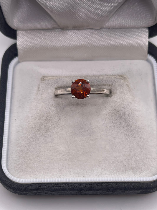 Silver topaz ring