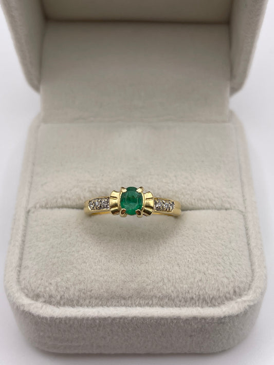 18ct gold emerald and diamond ring