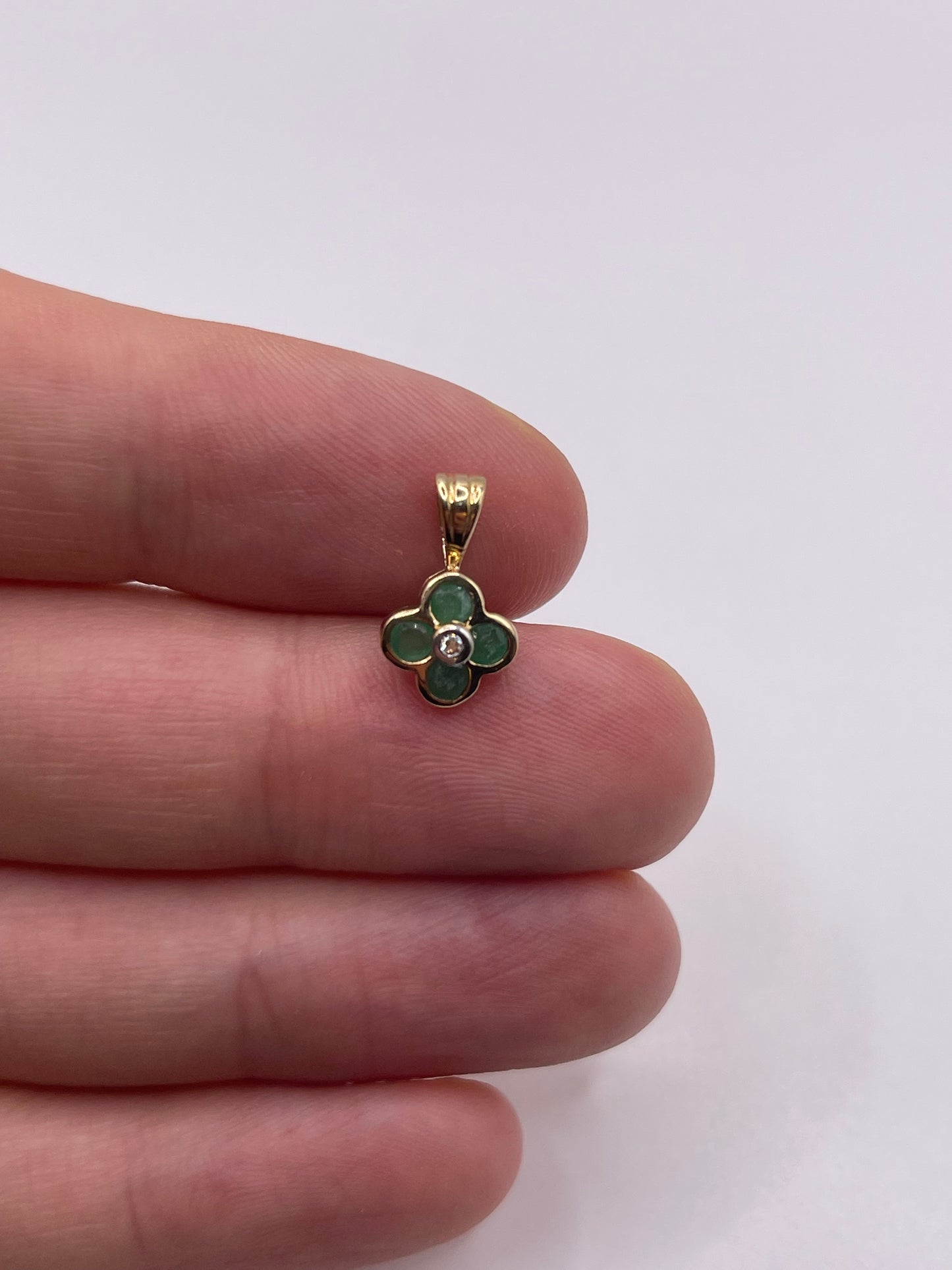 9ct gold emerald and diamond pendant
