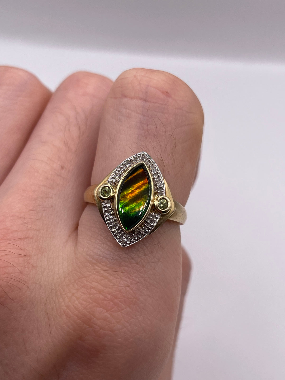 9ct gold Ammolite, peridot and diamond ring