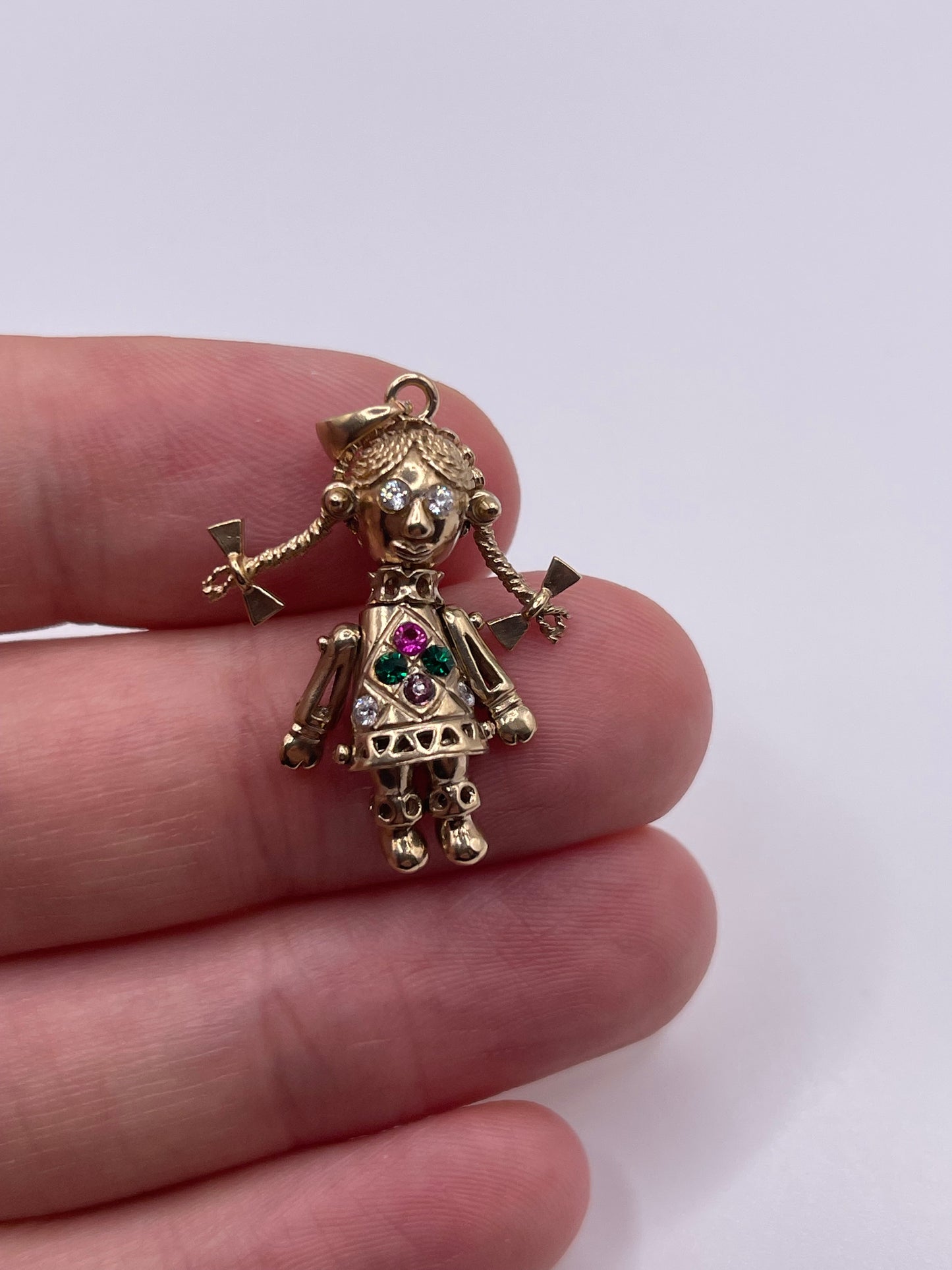 9ct gold articulated doll pendant