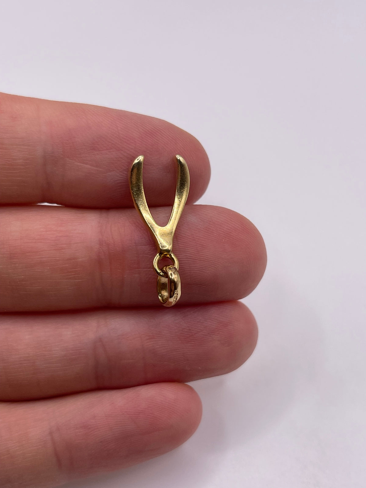 18ct gold diamond wishbone pendant