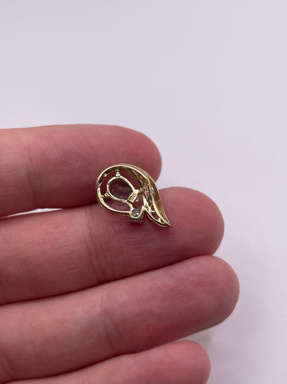 9ct gold blue topaz and diamond pendant