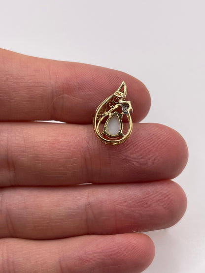 9ct gold opal and diamond pendant
