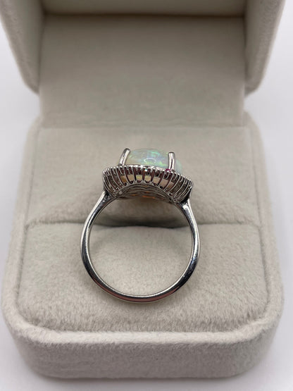 Platinum opal and diamond ring