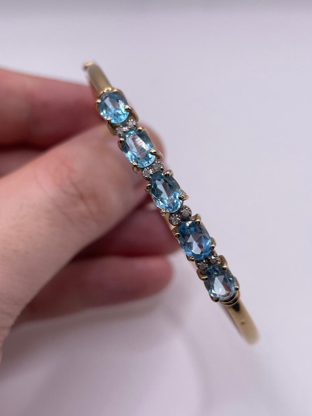 9ct gold blue topaz and diamond bangle