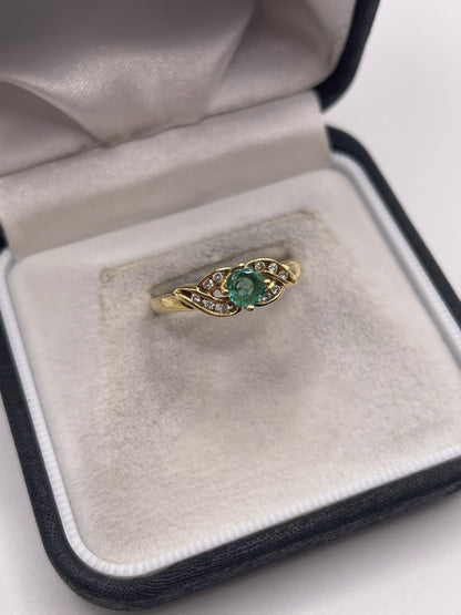 18ct gold emerald and diamond ring