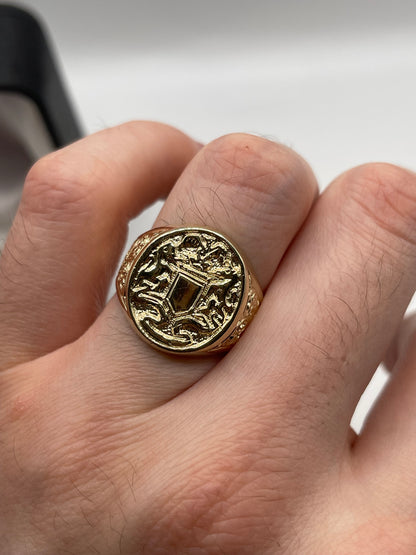 Heavy 9ct gold crest ring
