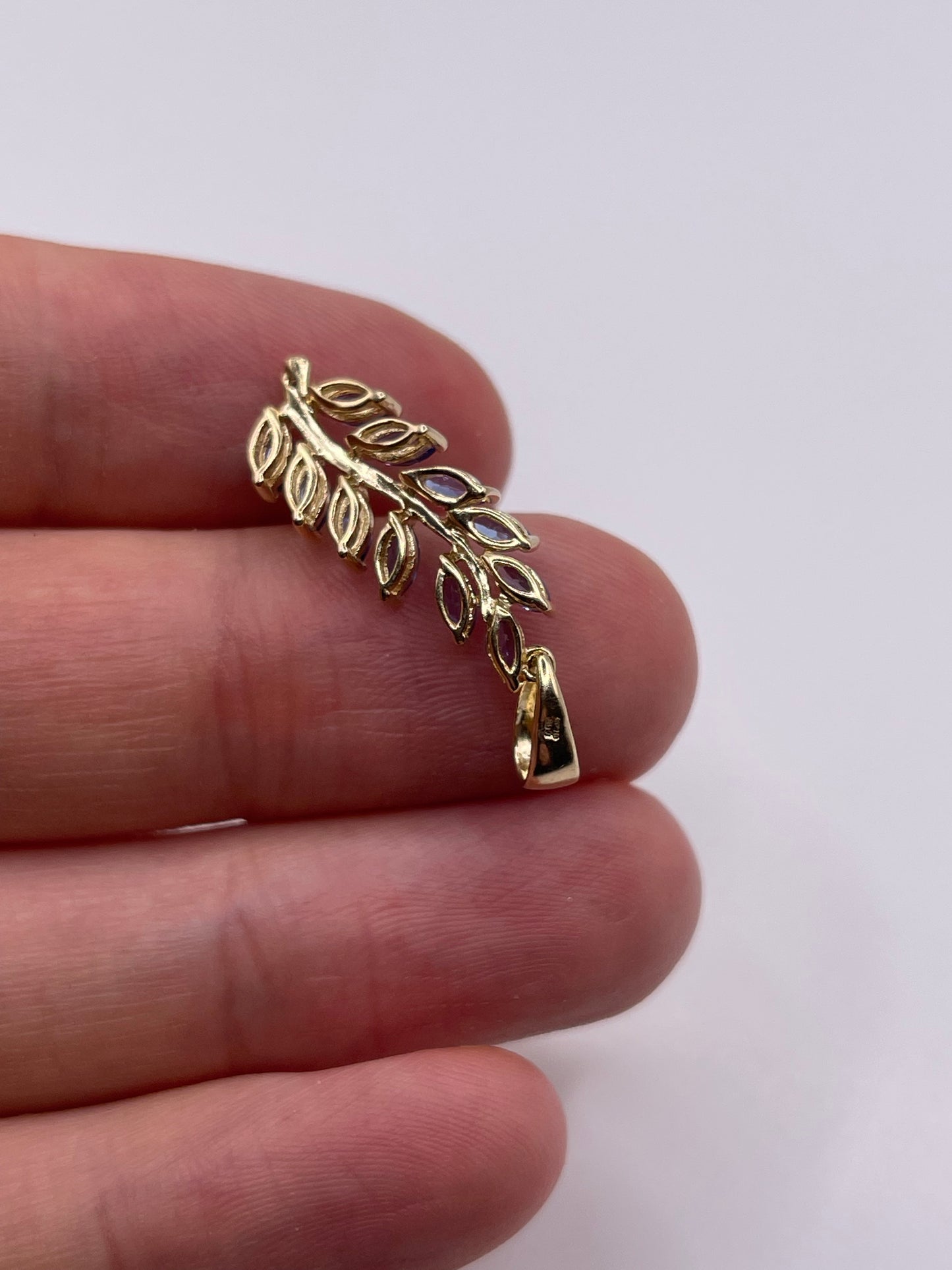 9ct gold tanzanite and diamond pendant