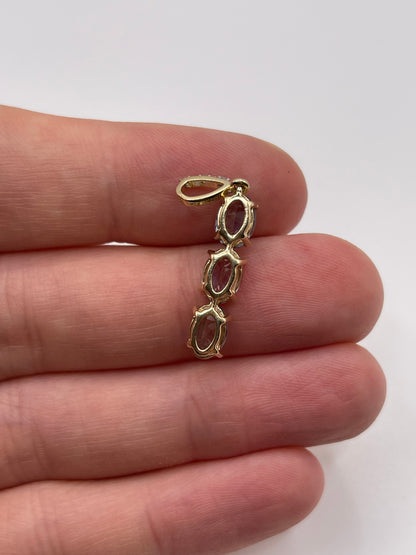 9ct gold tanzanite and diamond pendant