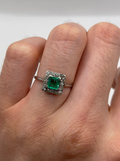 Platinum emerald and diamond ring