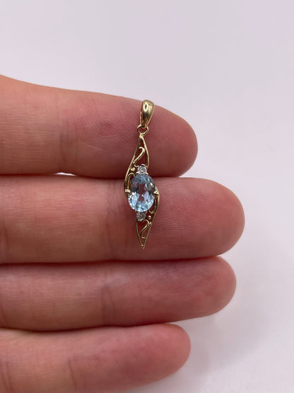 9ct gold topaz and diamond pendant