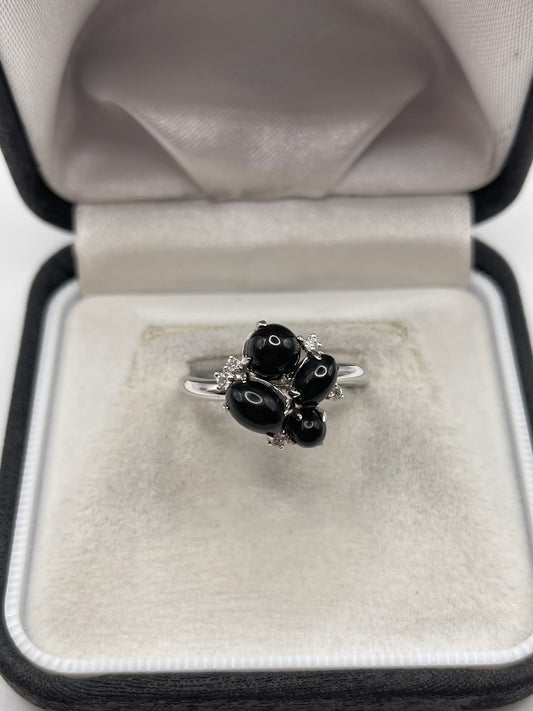18ct white gold jet and diamond ring