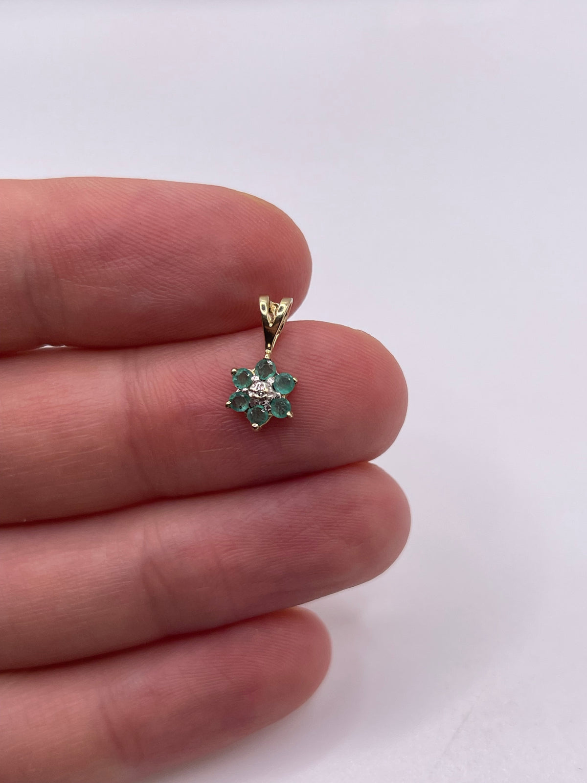 9ct gold emerald and diamond pendant