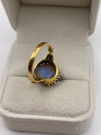 18ct gold solid black opal and diamond ring
