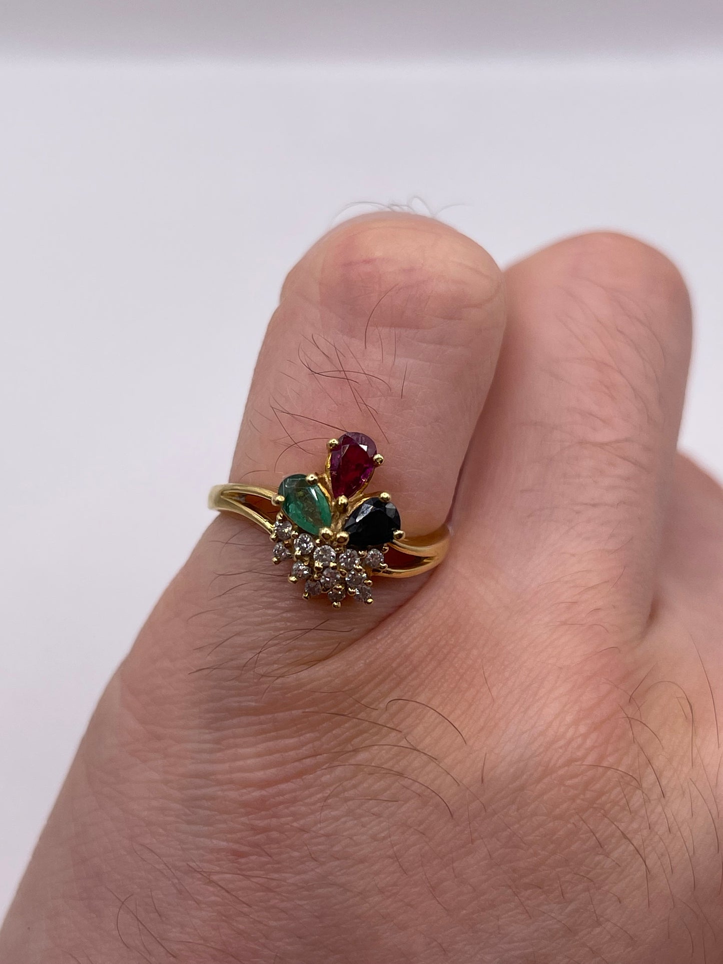 18ct gold ruby, sapphire, emerald and diamond ring