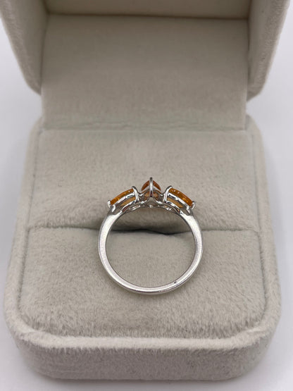 9ct white gold orange sapphire ring