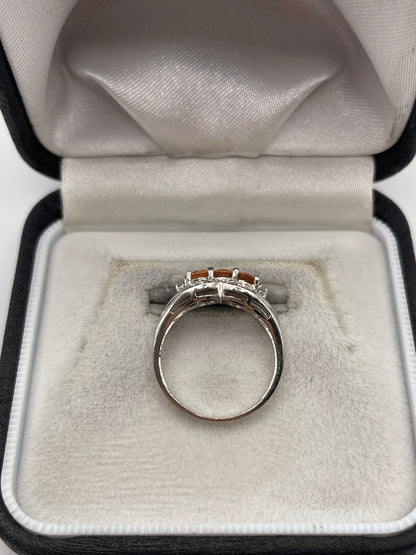 18ct white gold orange sapphire and diamond ring