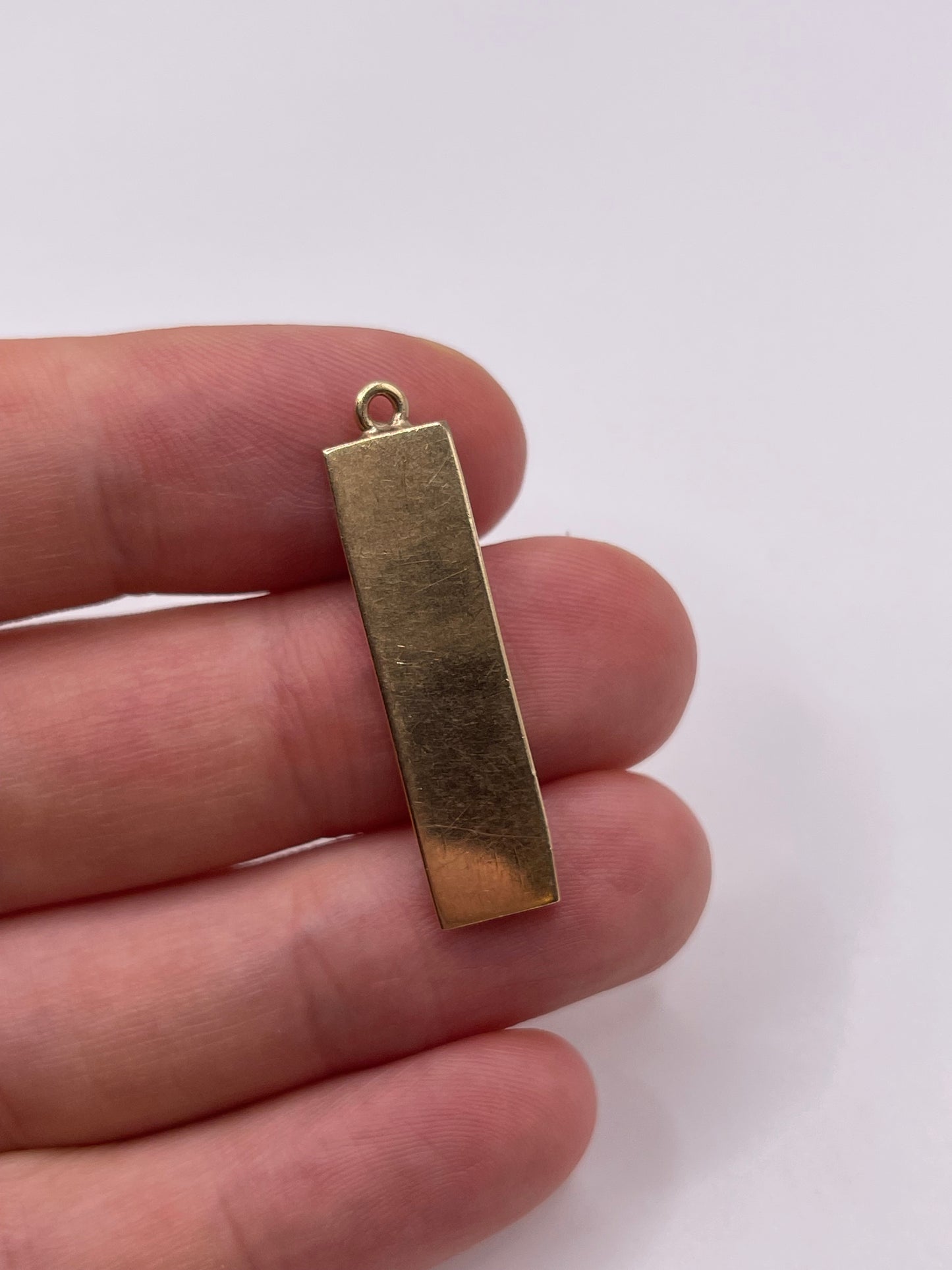 Heavy 9ct gold ingot pendant
