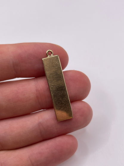 Heavy 9ct gold ingot pendant