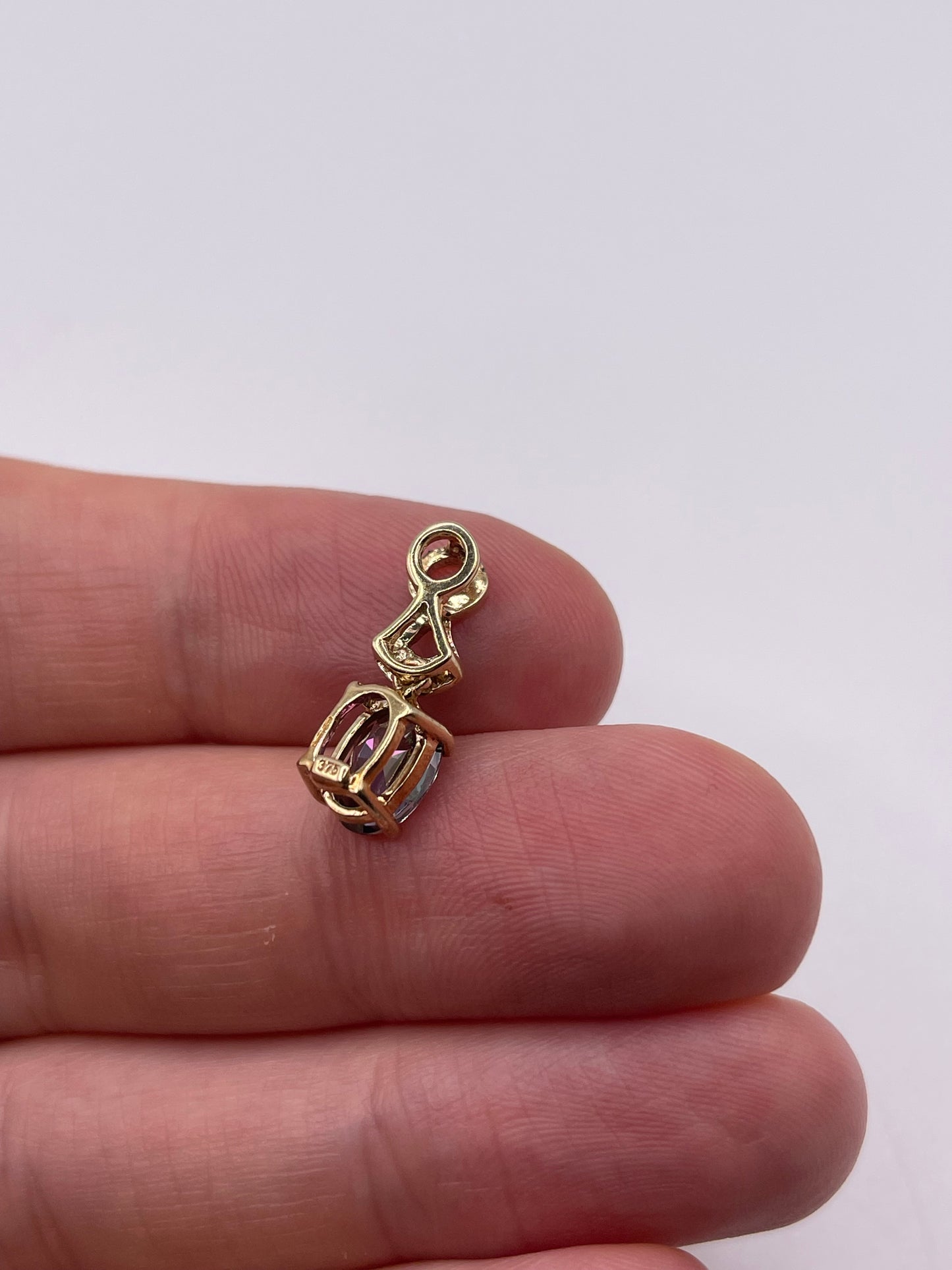 9ct gold mystic topaz and diamond pendant