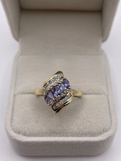 9ct gold tanzanite, aquamarine and diamond ring