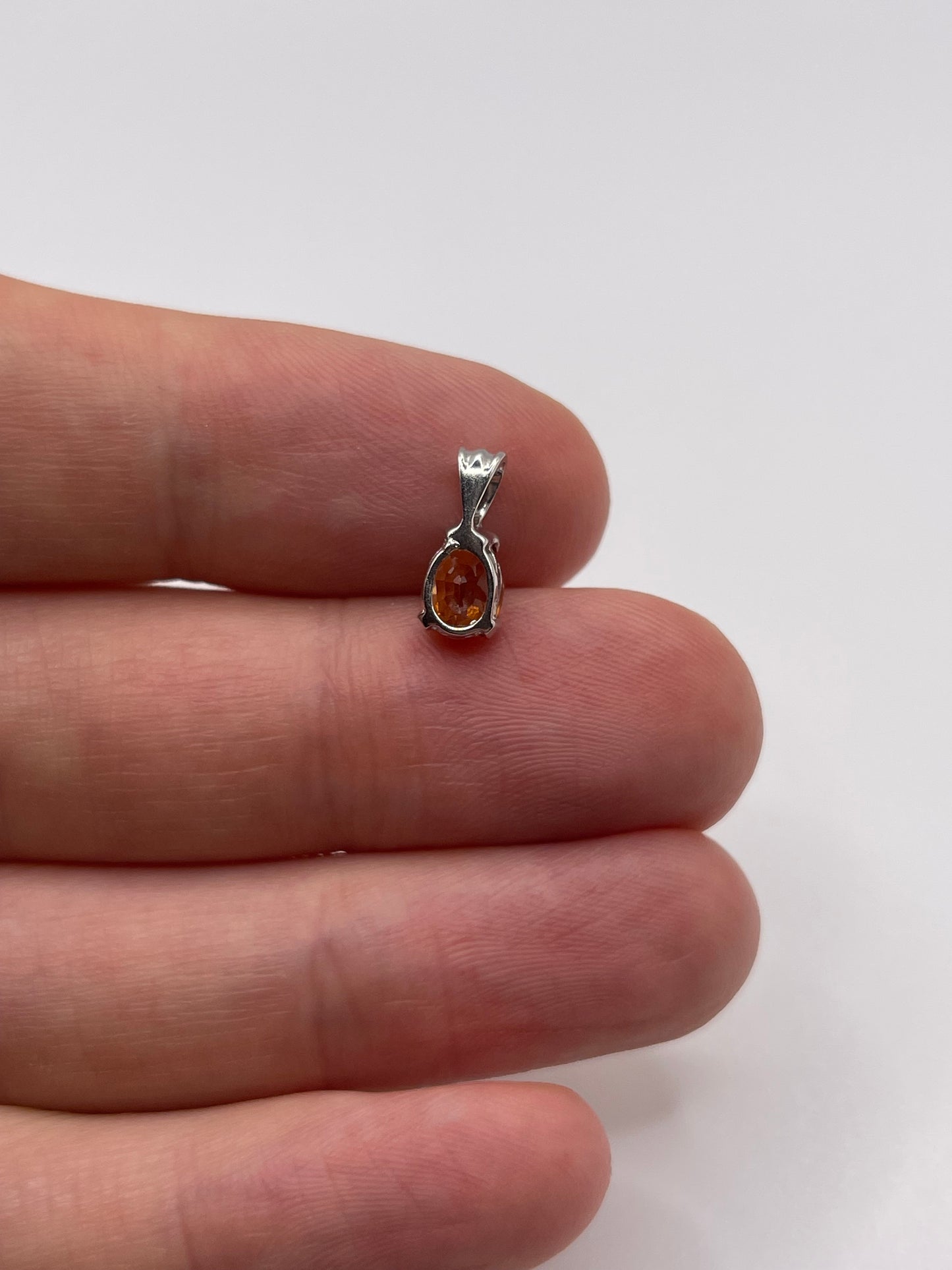 9ct white gold orange sapphire pendant
