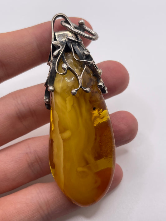 Silver amber pendant
