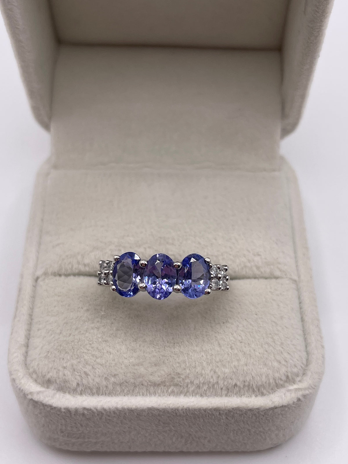 9ct white gold tanzanite and zircon ring