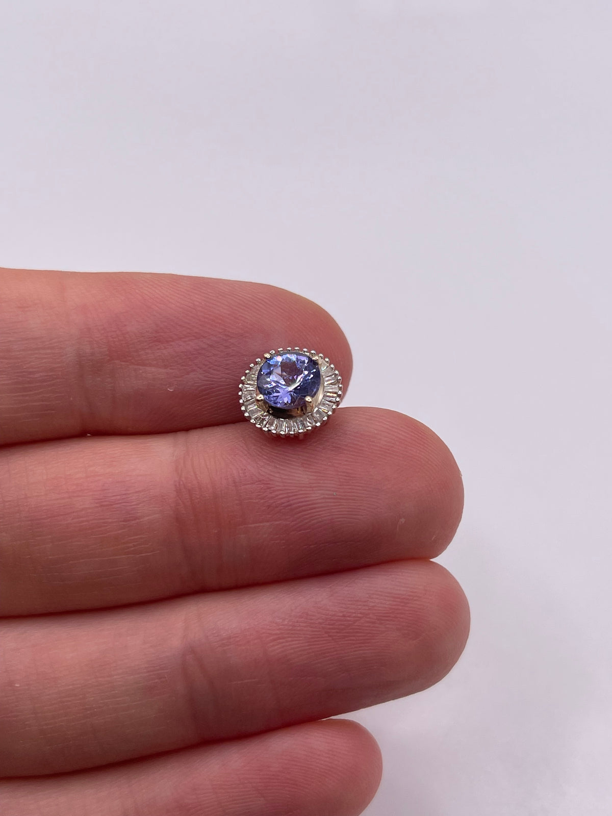 9ct gold tanzanite and diamond pendant