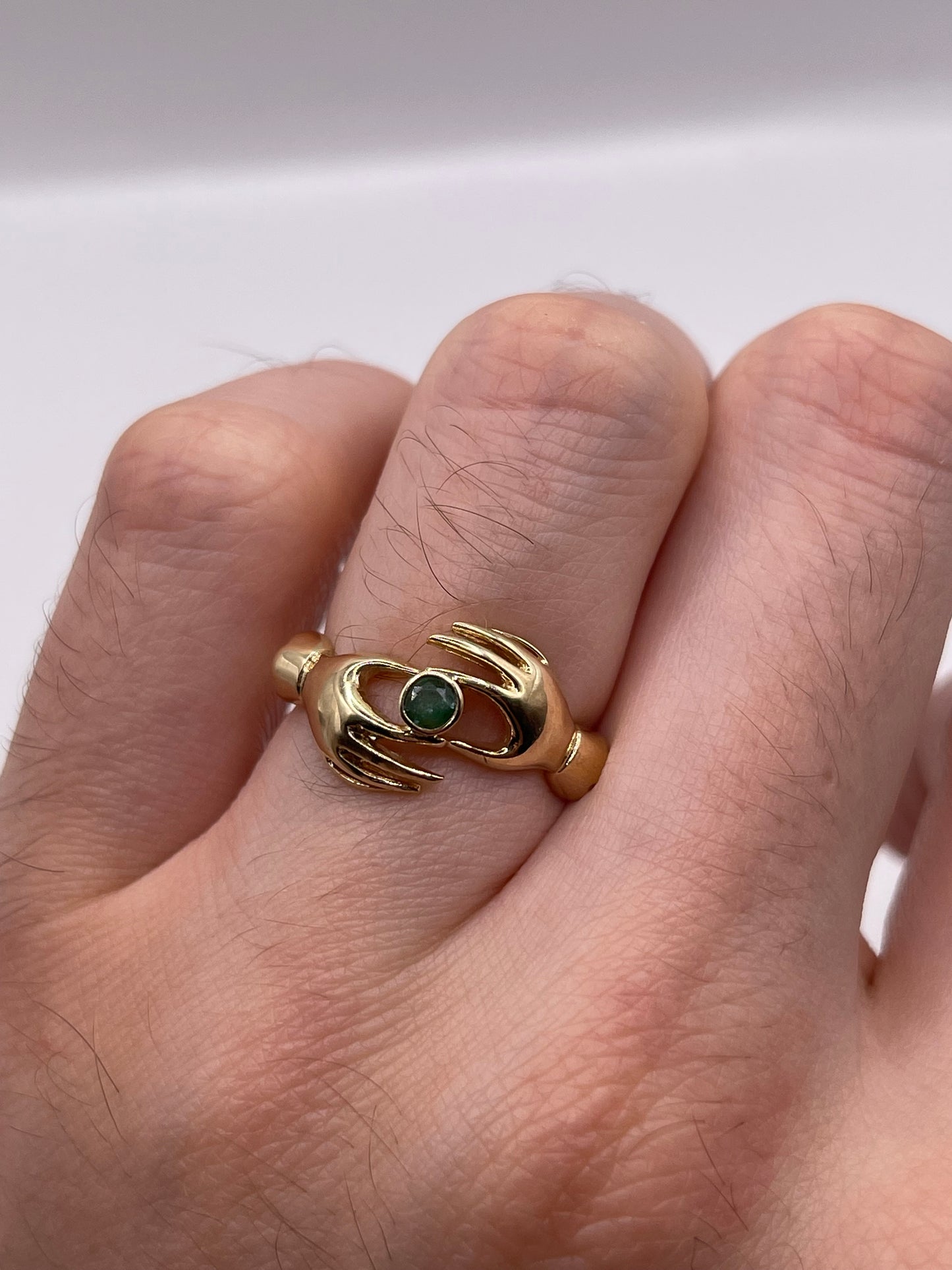 9ct gold emerald hand ring